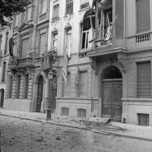 Houses damaged during the German bombardment of the centre of Antwerp. Circa October 1914