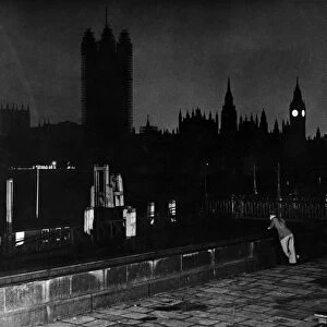 Houses of Parliament and the River Thames at night. August 1938
