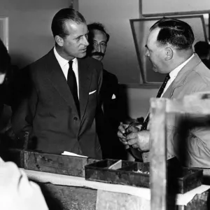 HRH Prince Philip, Duke of Edinburgh chats with employee Jack Price of Dowlais