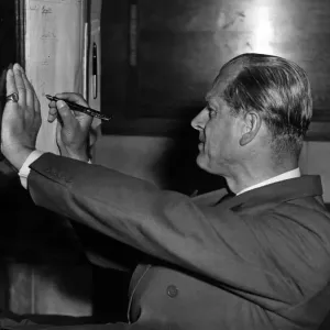 HRH Prince Philip, Duke of Edinburgh signing the visitors book at Barry