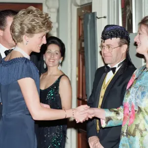 HRH Princess Diana, Princess of Wales is greeted by guests including singer Elton John HRH Princess Diana, Princess of Wales is greeted by guests including singer Elton John