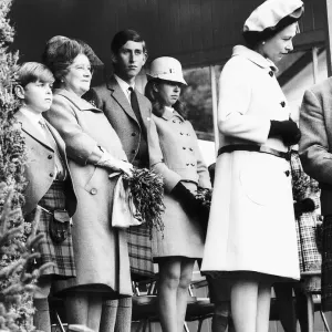 HRH Queen Elizabeth II standing with her children Prince Charles HRH Queen Elizabeth II standing with her children Prince Charles