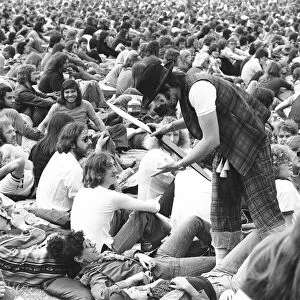 Huge crowds gather to watch the Rolling Stones in concert at Knebworth House