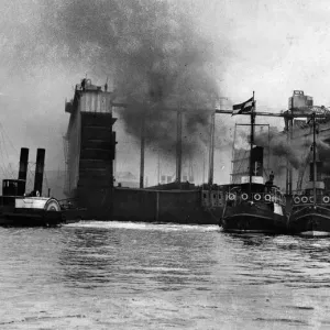 The huge floating dock built at Wallsend passes down the River Tyne on its long journey The huge floating dock built at Wallsend passes down the River Tyne on its long journey