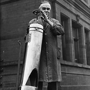 Hull ARP warden seen here with a large fire extinguisher. Circa 1940