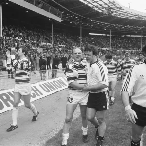Hull and Widnes players complete a lap of honour at the end of the Rugby League Cup Final Hull and Widnes players complete a lap of honour at the end of the Rugby League Cup Final