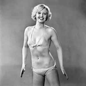 Humour / Smiling: Model June Hodgson - in bikini and exercising in a Leotard