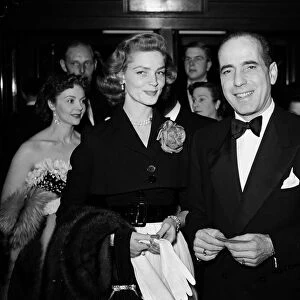Humphrey Bogart with his wife Lauren Bacall at a film premiere April 1951