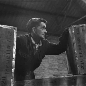 Some of the hundreds of chest of tea from all of the world being unloaded at the Ty-phoo Some of the hundreds of chest of tea from all of the world being unloaded at the Ty-phoo