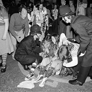 Hysterical Bay City Rollers fans outside the Odeon Hammersmith after the groups concert