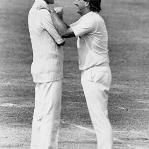 Ian Botham and Bob Willis laughing together during match - August 1983