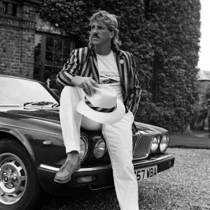 Ian Botham in his new role as fashion model, Birtles Hall, Cheshire. 7th June 1985 Ian Botham in his new role as fashion model, Birtles Hall, Cheshire. 7th June 1985