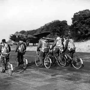 Images believes to show aircrew members of the 106th Bomber Squadron seen here cycling
