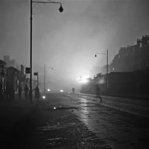 Incendiary bombs drop on Camberwell, London, during a raid on the city on the 8th - 9th