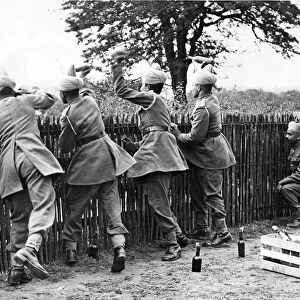 Indian Troops in camp in Derbyshire. They are giving a demonstration in throwing