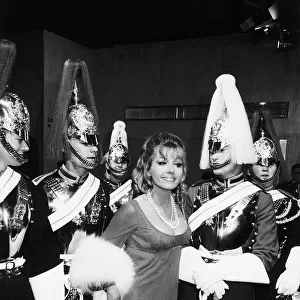 Ingrid Pitt surrounded by a group of Household Cavalry - July 1970 Dbase MSI