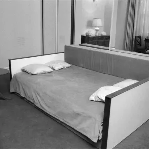 Interior view of a flat, showing the living room area and sofa bed. 29th October 1986 Interior view of a flat, showing the living room area and sofa bed. 29th October 1986