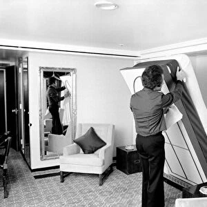 Interior view showing one of the bedrooms aboard the luxury passenger liner QE2