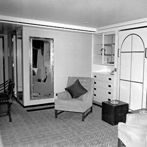 Interior view showing one of the cabin living rooms aboard the luxury passenger liner QE2