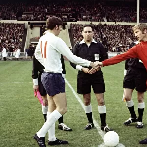 International Football England v Wales. Martin Peters and Alan Durban shake hands before