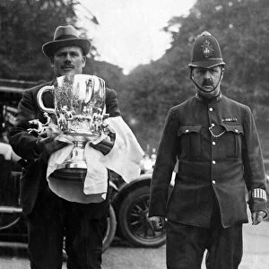 International Polo Cup, won by America. The lost cup. Carrying the Polo cup to