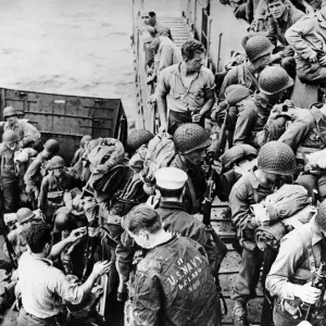 Invasion Embarkment. Climbing out of an LCVP (Landing Craft, Vehicle Personnel) U Invasion Embarkment. Climbing out of an LCVP (Landing Craft, Vehicle Personnel) U