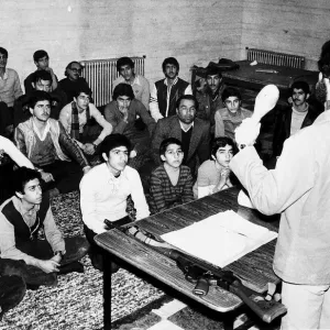 Iran boys and men being in instructed by military teacher. 1979 Iran boys and men being in instructed by military teacher. 1979