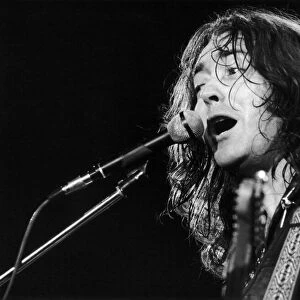 Irish blues rock musician and singer Rory Gallagher piuctured performing in concert
