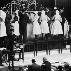 Print of Nurses assisting with the Irish Sweepstake draw in 1930
