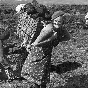 Irish peat cutters on Achill Island County Mayo, Ireland New use for peat