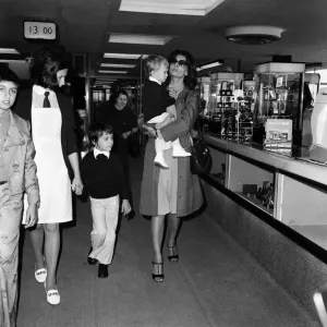 Italian actress Sophia Loren and her two children leaving Heathrow Airport for Rome Italian actress Sophia Loren and her two children leaving Heathrow Airport for Rome