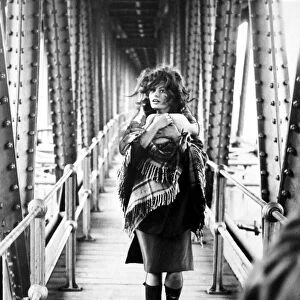 Italian film star Sophia Loren walks along the catwalk on the Crumlin Viaduct where she