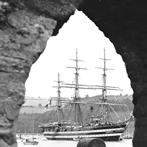 The Italian sail training ship Amerigo Vespucci framed in an archway on the River Dart