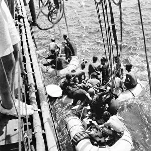 Italian sailors waiting to board a British Ship after their ship was sunk in
