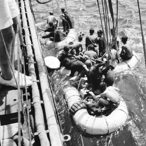 Italian sailors waiting to board a British Ship after their ship was sunk in