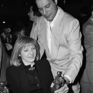 The Ivor Novello Awards. Pictured, Freddie Mercury of Queen and Mary Austin
