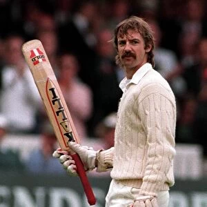 Jack Russell of England walks off at Lords after scoring 124 runs in the second test