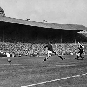 Jackie Milburn, the Newcastle centre forward scores Newcastles 1st goal during the F