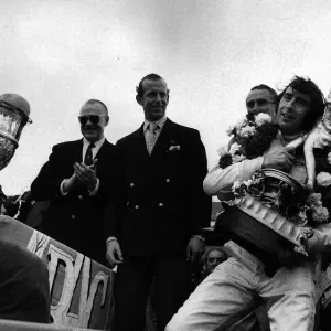 Jackie Stewart after winning British Grand Prix holding trophy July 1969 Jackie Stewart after winning British Grand Prix holding trophy July 1969