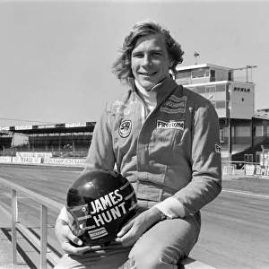 James Hunt, (British racing driver) poses for camera before he tests his Hesketh car at