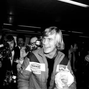 James Hunt, the new World Motor Racing Champion, received a hero James Hunt, the new World Motor Racing Champion, received a hero