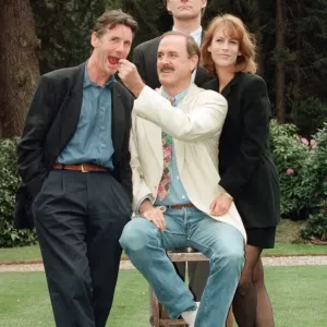 Jamie Lee Curtis, John Cleese (centre in the white jacket and jeans) Jamie Lee Curtis, John Cleese (centre in the white jacket and jeans)