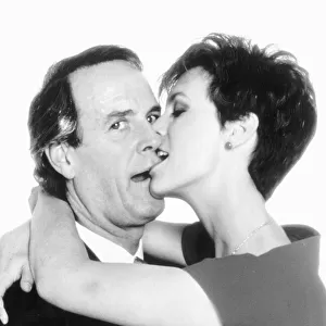 Jamie Lee Curtis kissing John Cleese October 1988