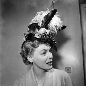 Jane Morgan In crazy hats she would like to wear. April 1953 D1685