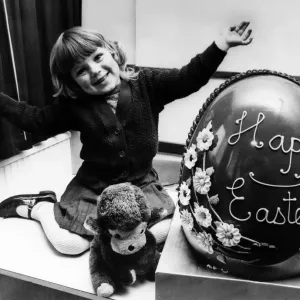 Janette Lee aged 3, from Wallsend, with giant 25ib 30in high Chocolate Easter Egg donated Janette Lee aged 3, from Wallsend, with giant 25ib 30in high Chocolate Easter Egg donated