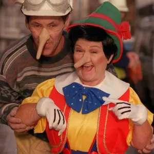 Janette Tough Print - Jimmy Krankie as Pinocchio with Builder Janette Tough Print - Jimmy Krankie as Pinocchio with Builder