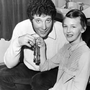 Print of Jayne King presenting a miners lamp to Tom Jones at the Capitol Theatre, Cardiff