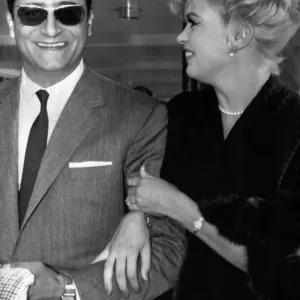 Jayne Mansfield at Prestwick Airport in Scotland with Italian film producer Enrico Bomba Jayne Mansfield at Prestwick Airport in Scotland with Italian film producer Enrico Bomba