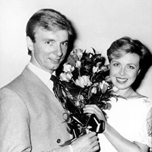 Jayne Torvill and Christopher Dean at the Chelsea flower show with bouquet of Bees of