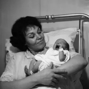Jazz singer Cleo Laine pictured with her new baby daughter Jaqueline. 6th February 1963 Jazz singer Cleo Laine pictured with her new baby daughter Jaqueline. 6th February 1963